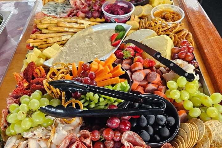 a bunch of different types of food on a table
