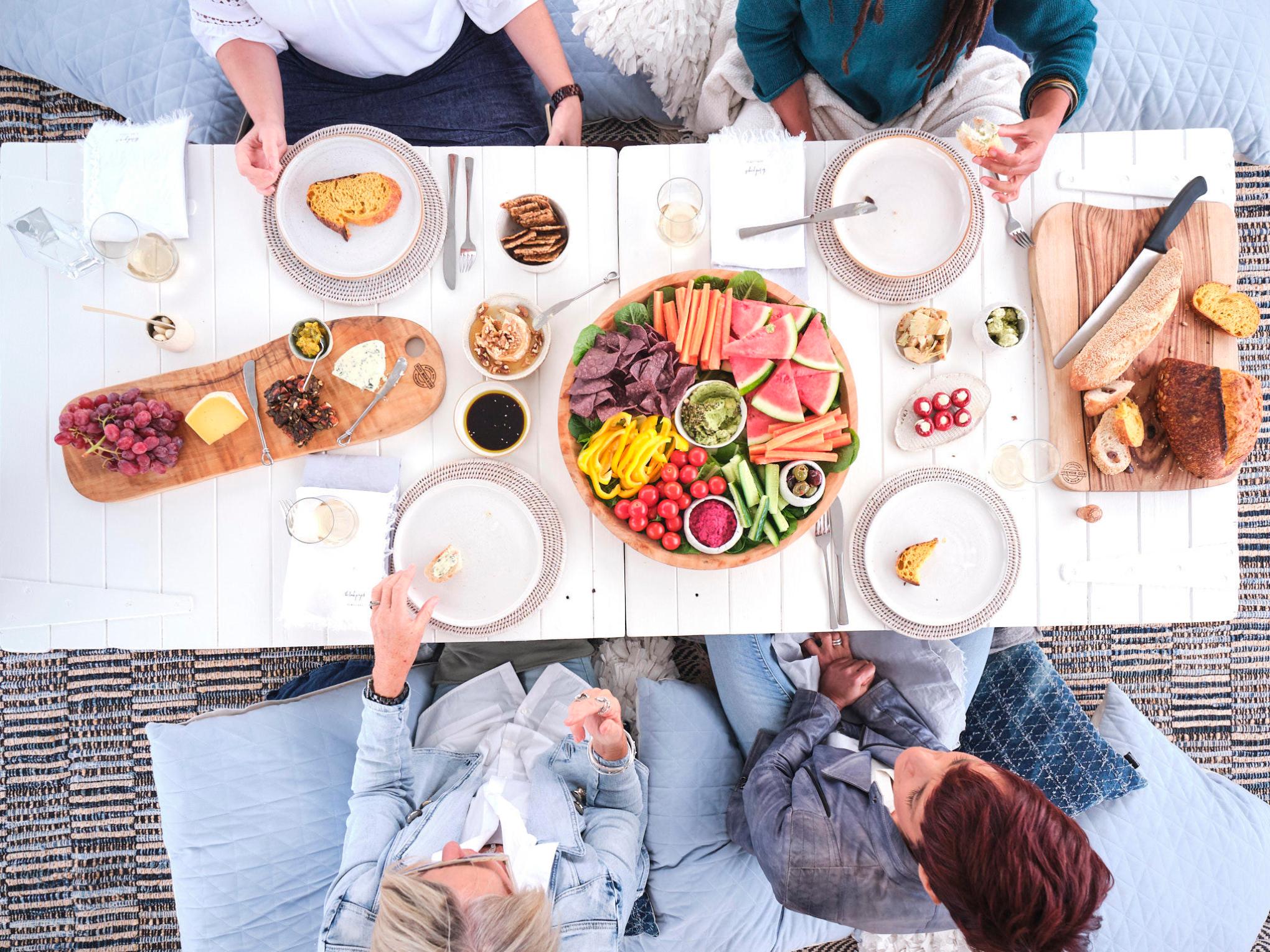 a group of people sitting at a table