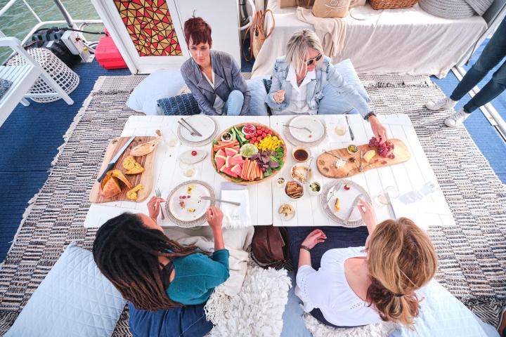 a group of people sitting at a table