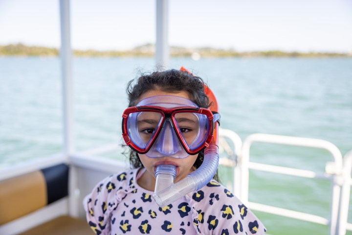 a person swimming in a body of water