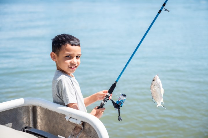 a boy in a body of water