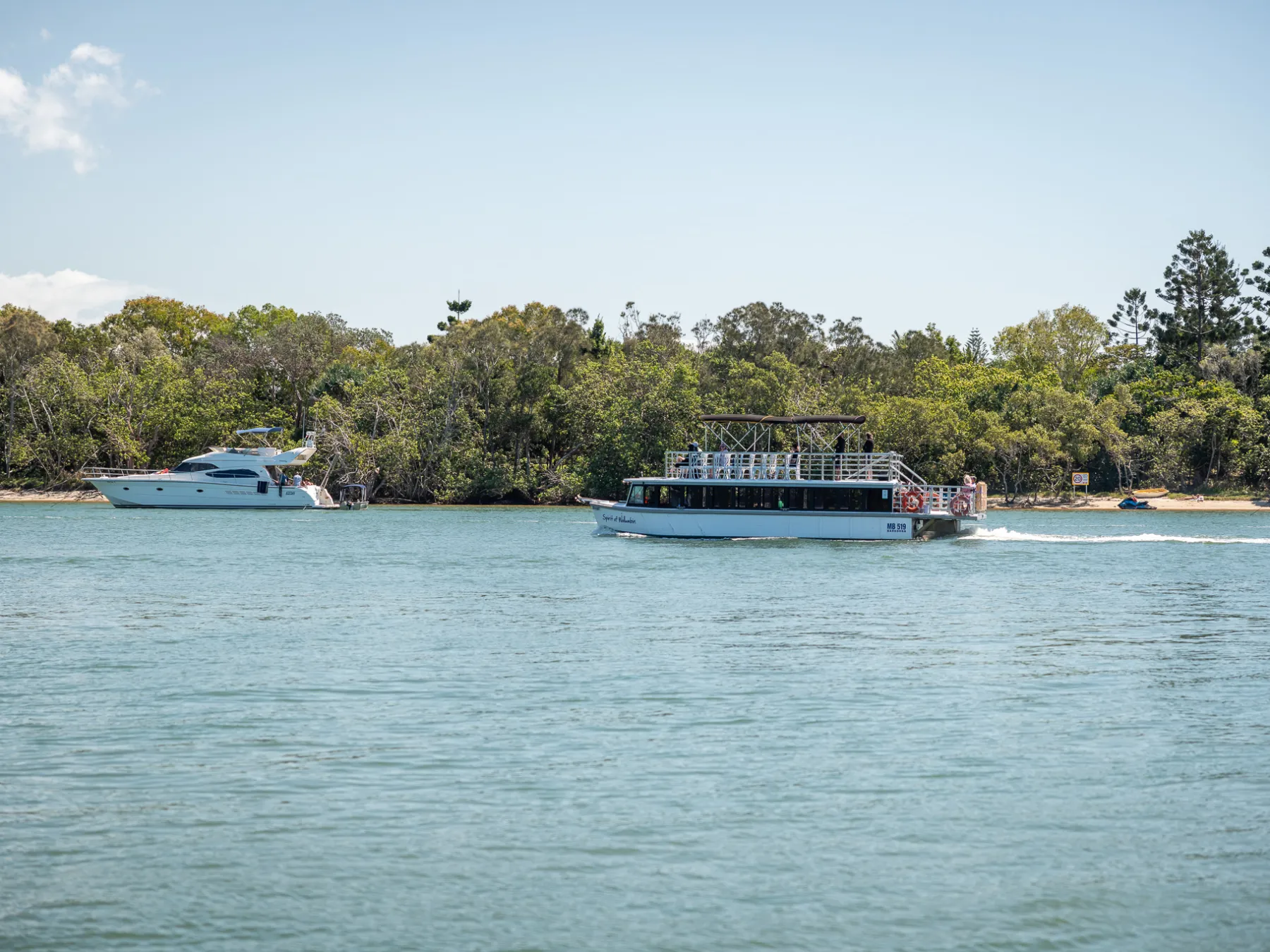 a boat that is floating in the middle of a body of water