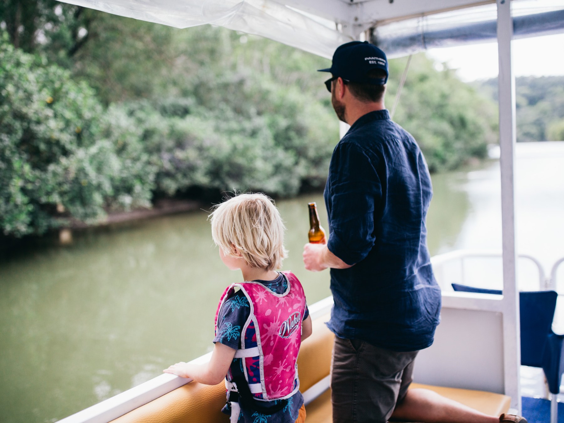 a little boy looking at the camera