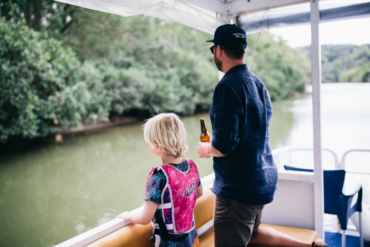 a little boy looking at the camera