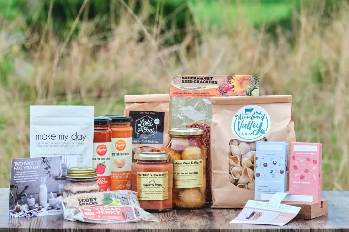 a book sitting on top of a grass covered field
