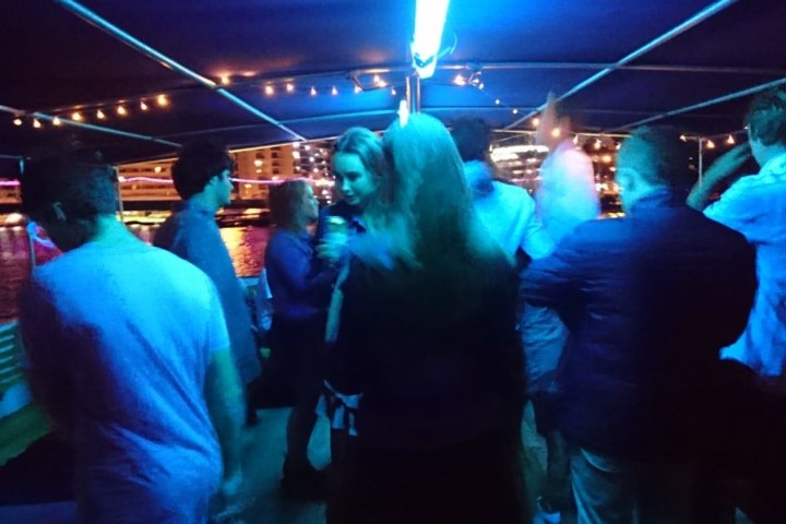 a group of people on a stage in front of a crowd