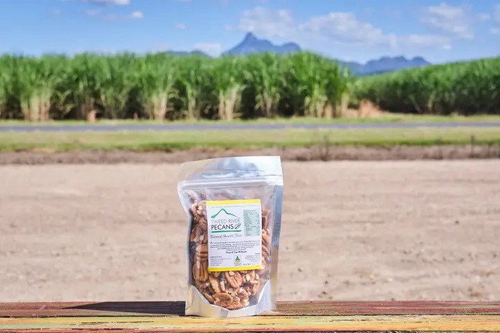 a sign on a dirt road