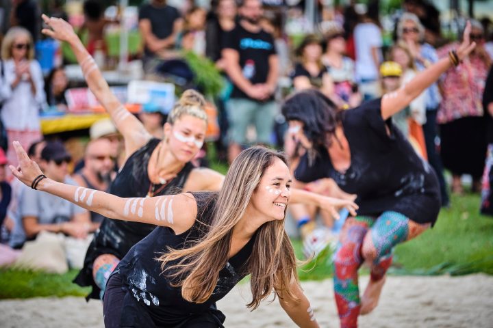 a person standing in front of a crowd