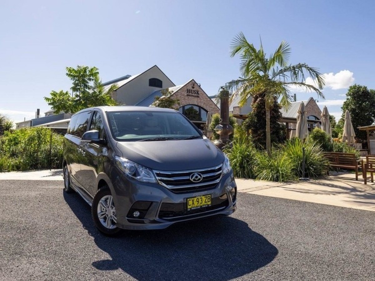 a car parked in front of a house