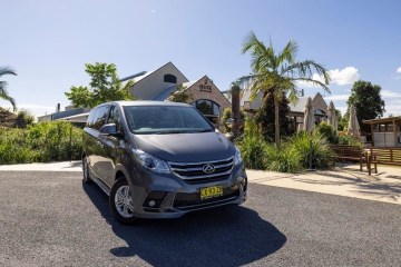 a car parked in front of a house