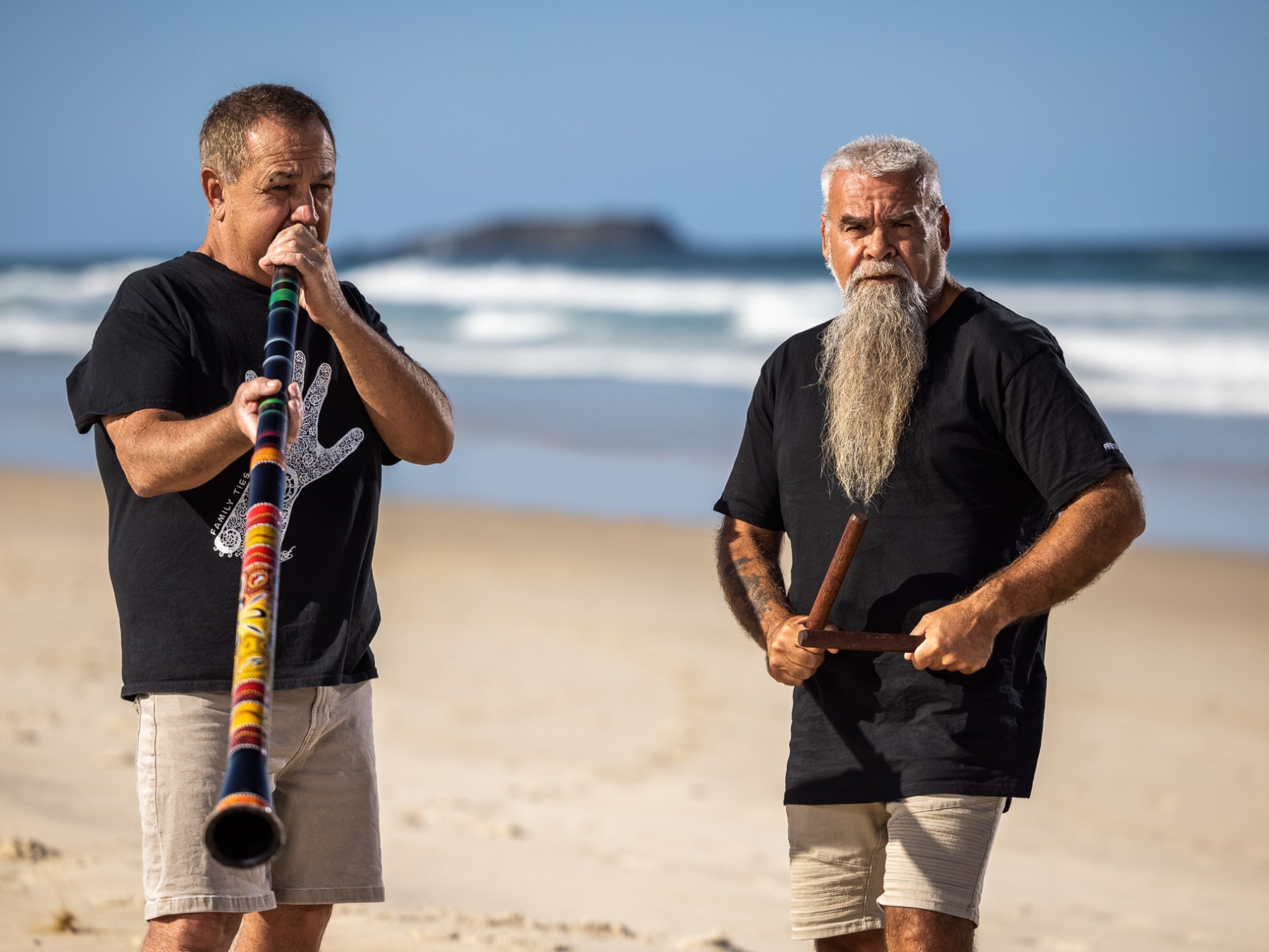 a man walking on a beach