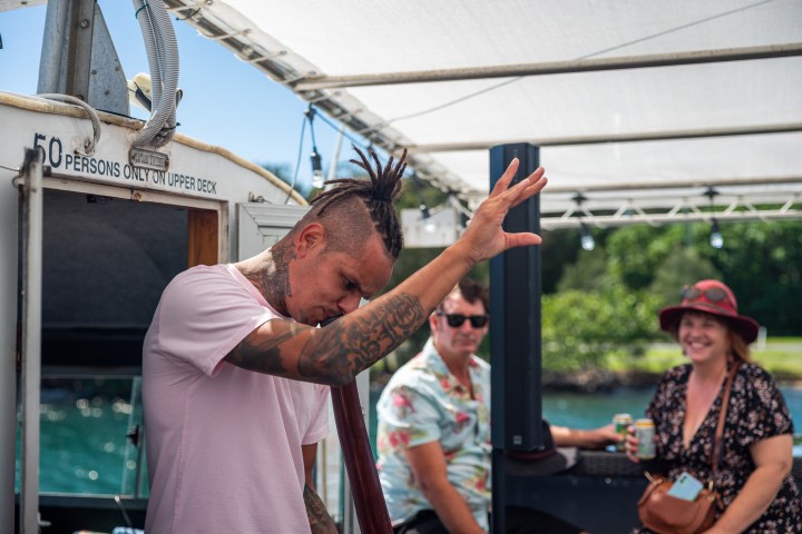 a man standing in front of a building